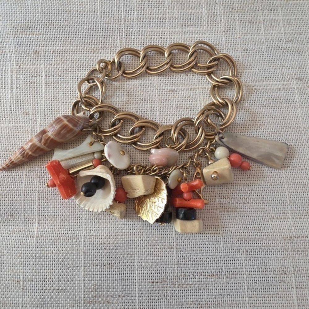 Gold Charm Bracelet with Shell Accent White And Coral Colored Sea Shells